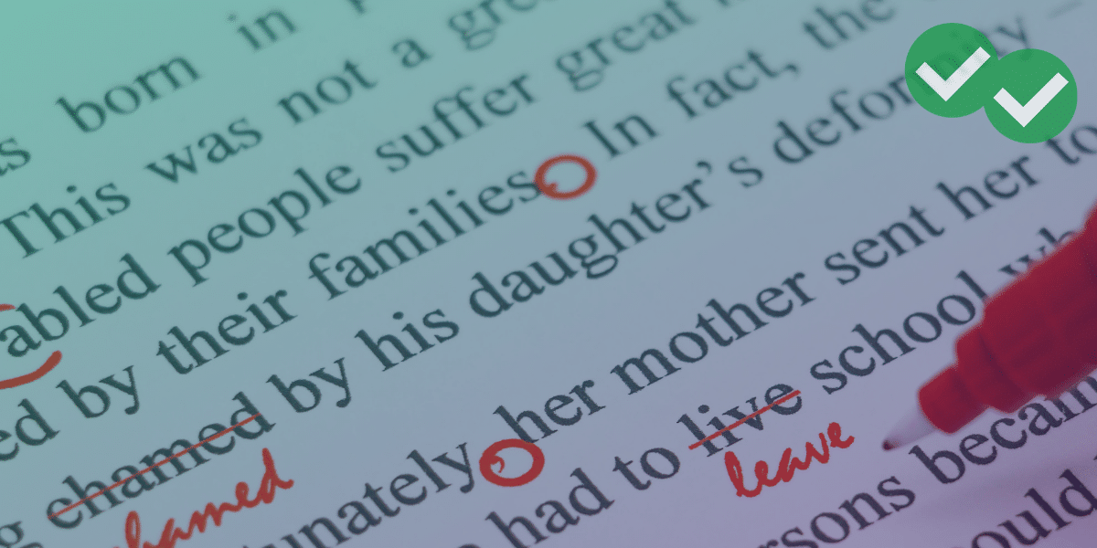 red pen correcting grammar in a sentence on paper