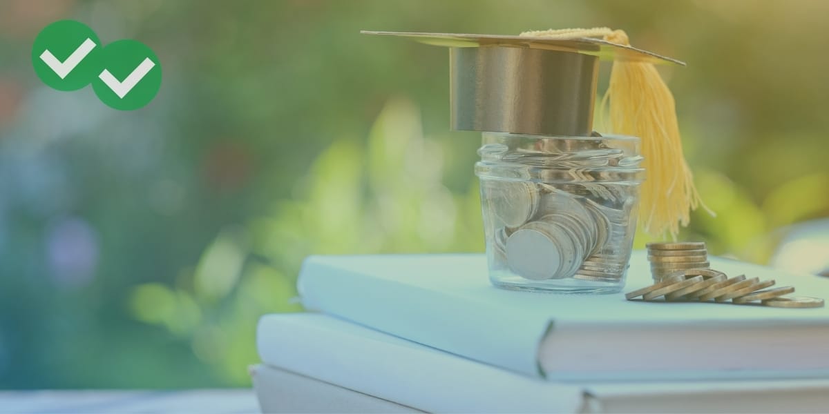 Graduation cap over coins and books to represent ACT score for bright futures scholarship