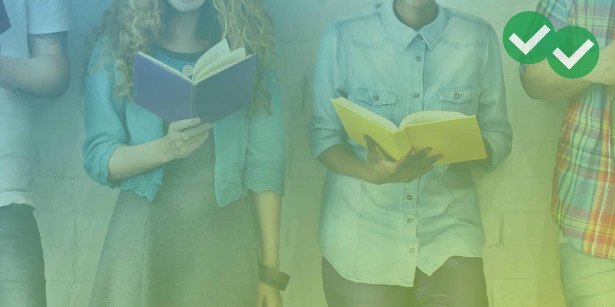 Students reading a book while standing