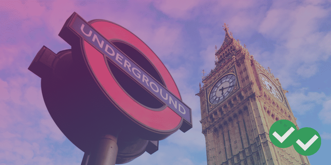 Westminster Underground Station sign next to Big Ben Clock Tower