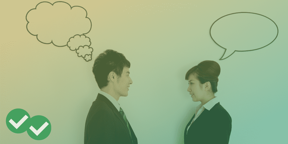A man and woman in business attire face each other with speech and thought bubbles above their heads
