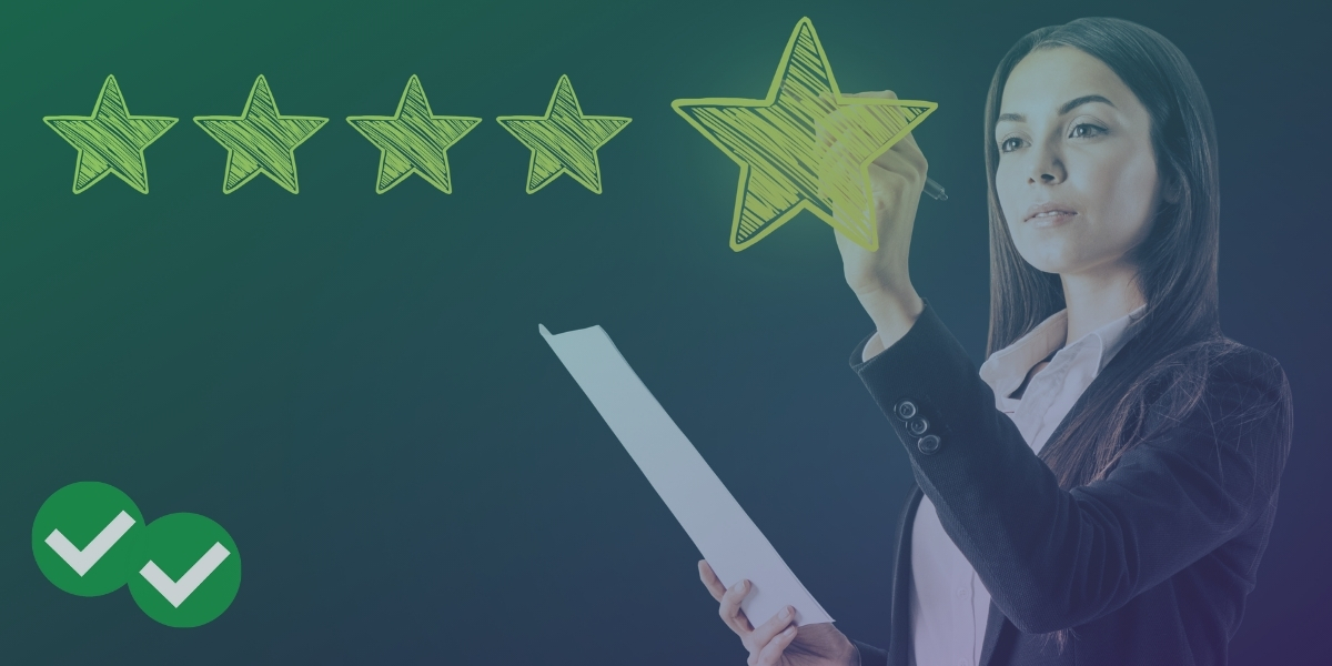 Businesswoman drawing 5 stars to show MBA rankings
