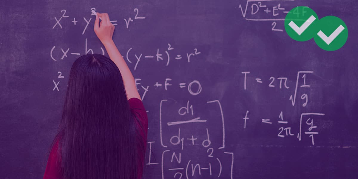 Student writing GRE Algebra equations on blacboard -image by magoosh