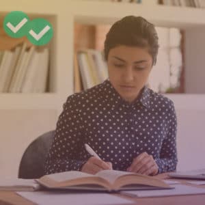 Student writing in IELTS Academic Writing Practice Test