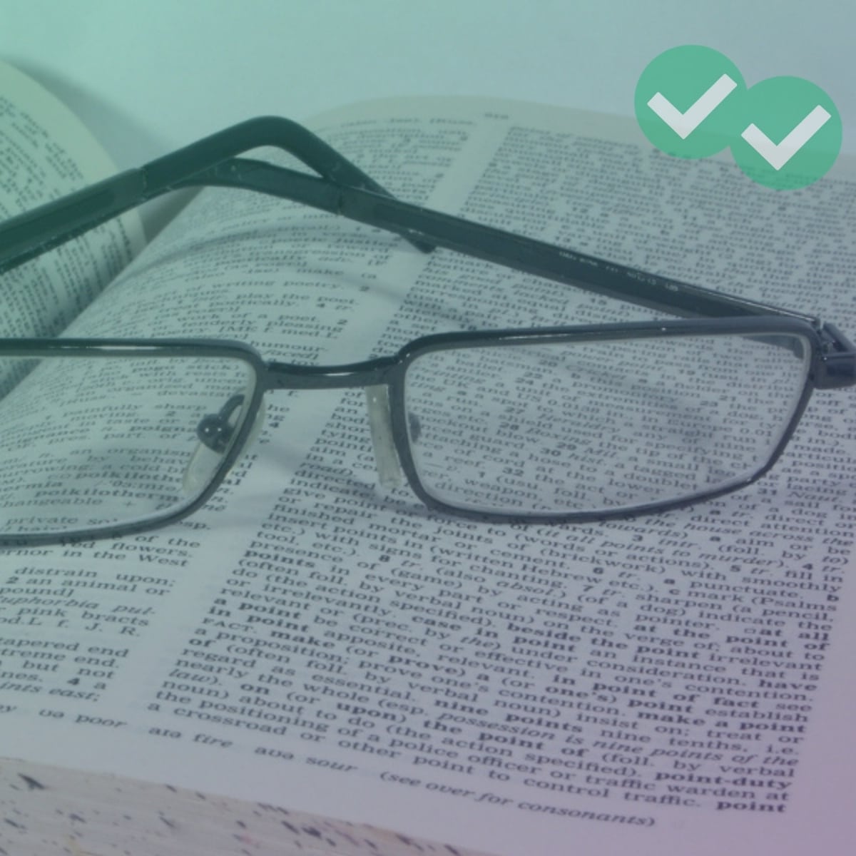 Glasses over dictionary showing lexical resource - image by Magoosh