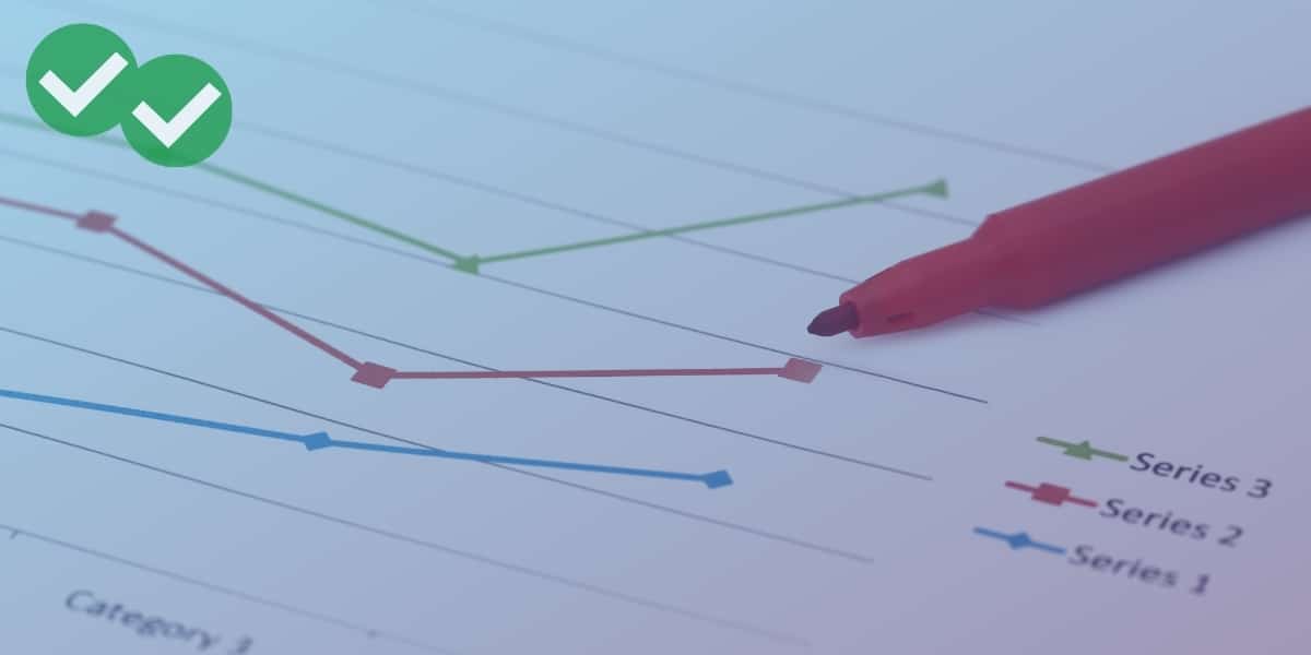 Red marker over IELTS writing line graph - image by Magoosh