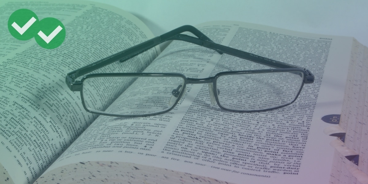 Glasses over dictionary showing lexical resource - image by Magoosh