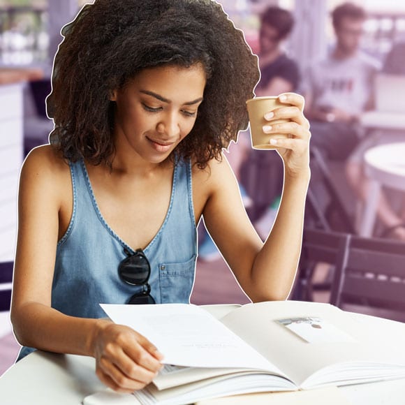woman studying in coffee shop