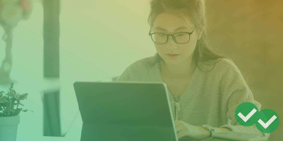 A student taking an online test on a laptop